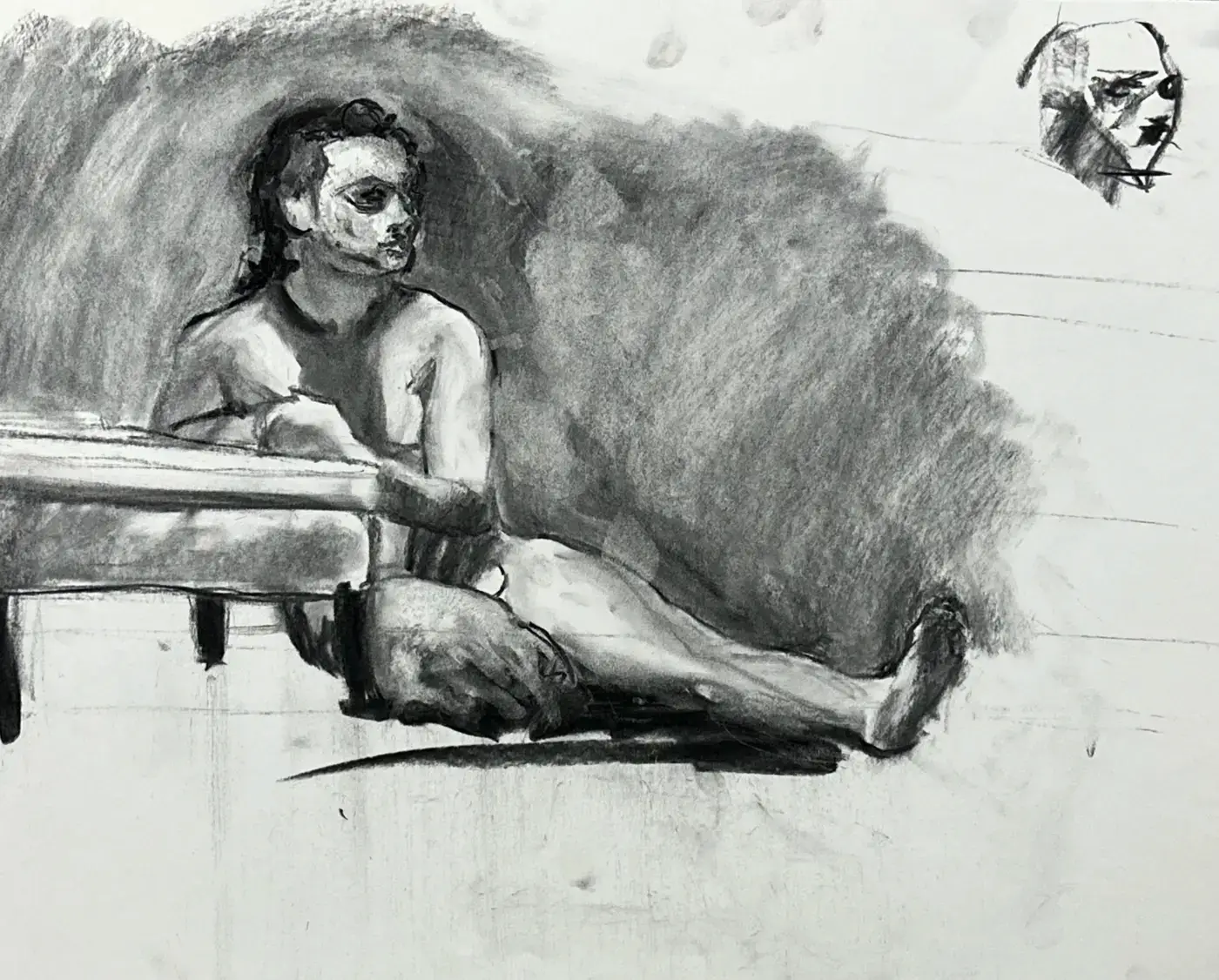 Charcoal figure study of two reclining figures